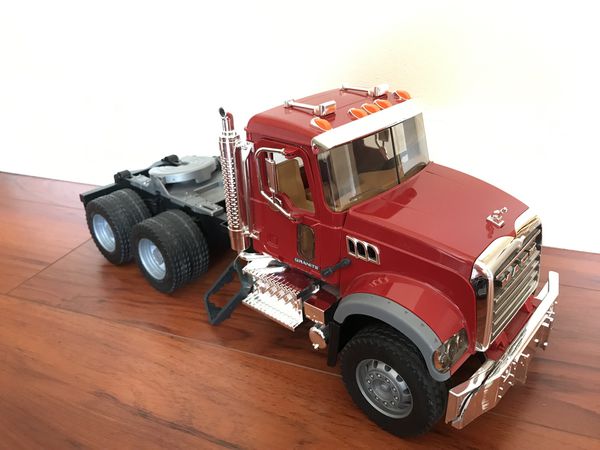 Bruder Mack Granite Flatbed Truck with JCB Loader Backhoe 02813